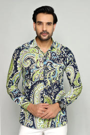 Man wearing a patterned shirt with a gray background