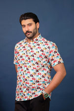 Load image into Gallery viewer, Men wearing multicolor elephant print cotton shirt with quirky handcrafted pattern by Rangat Jaipur.