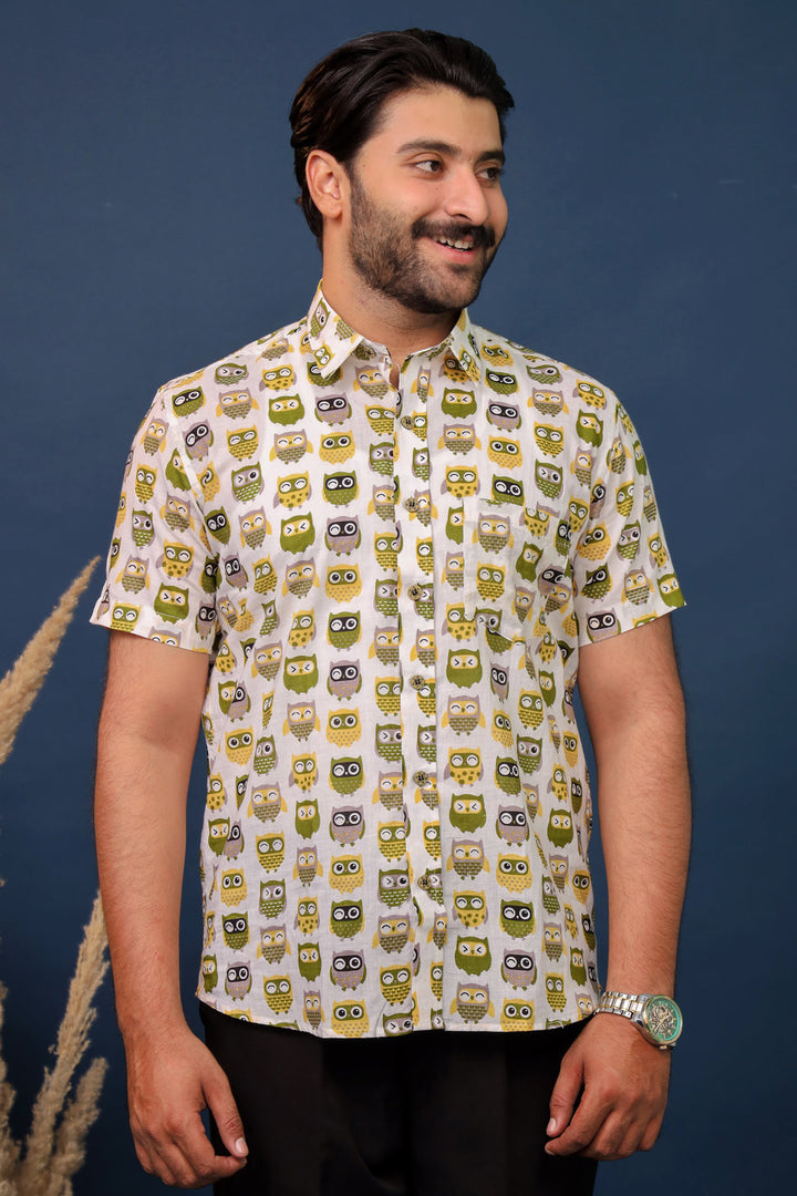 Men wearing white owl print cotton shirt with quirky handcrafted pattern by Rangat Jaipur.