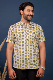 Men wearing white owl print cotton shirt with quirky handcrafted pattern by Rangat Jaipur.