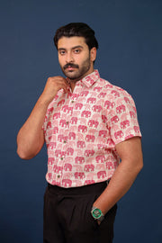 Men wearing pink elephant print cotton shirt with handcrafted ethnic pattern by Rangat Jaipur.