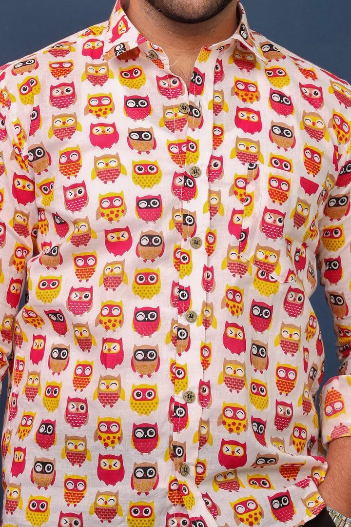Closeup of colorful owl print on cotton Sanganeri shirt